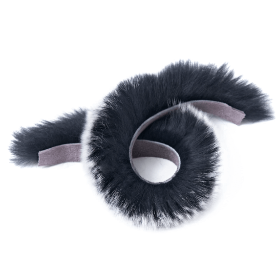 Premium fur string silencer rolled up, showcasing its soft texture and flexible design for bowstring noise reduction.