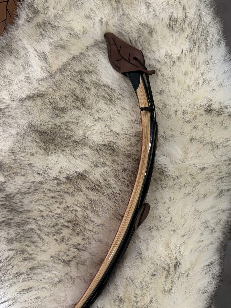 Solkarra kangaroo leather string keeper, leaf shaped tip cap with arrow button, view 4