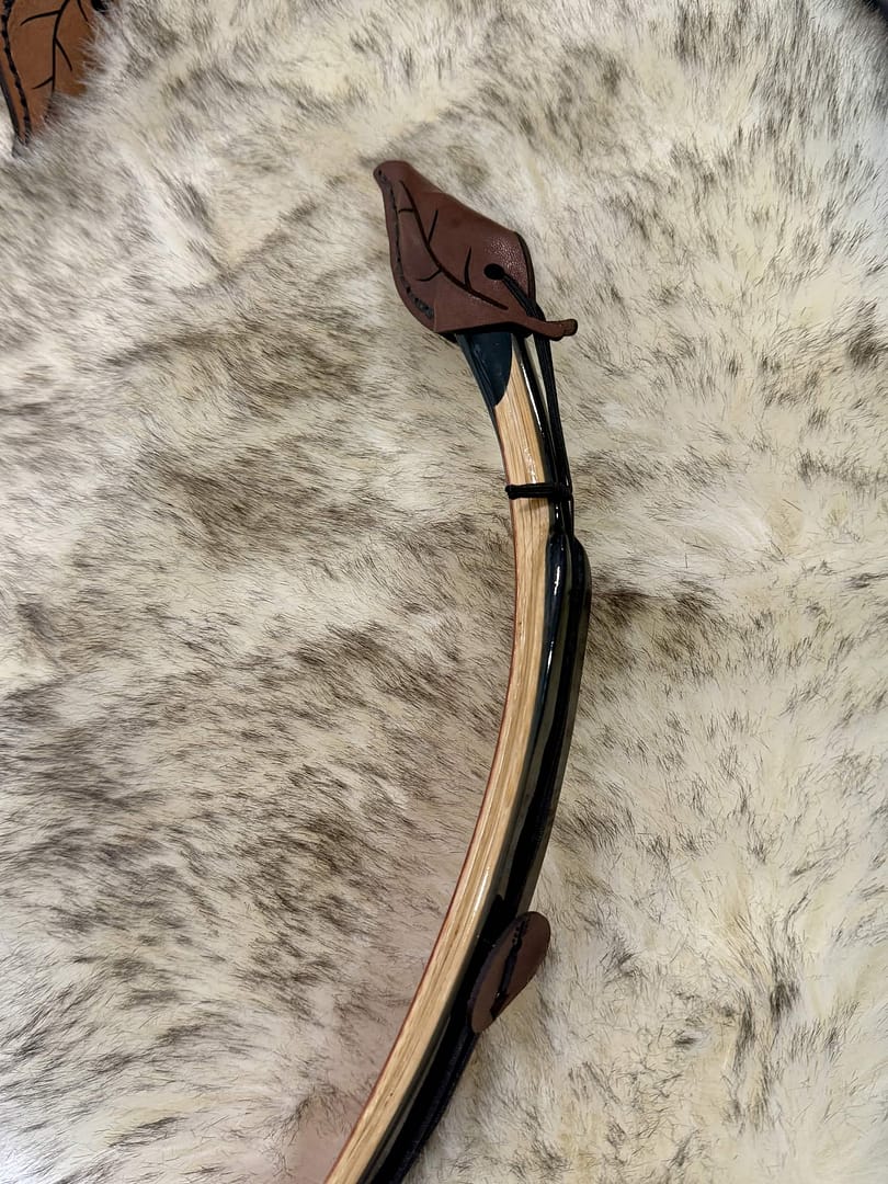 Solkarra kangaroo leather string keeper, leaf shaped tip cap with arrow button, view 5